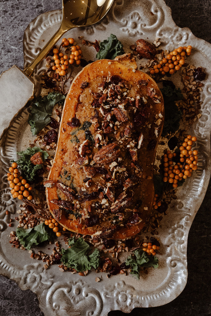 Quinoa Stuffed Butternut Squash with Cranberries, Pecans and Kale